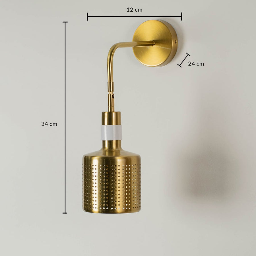 Dimensions of the gold wall light measuring 34 cm in height 12 cm in width and 24 cm in depth featuring a perforated metal shade and white accent.
