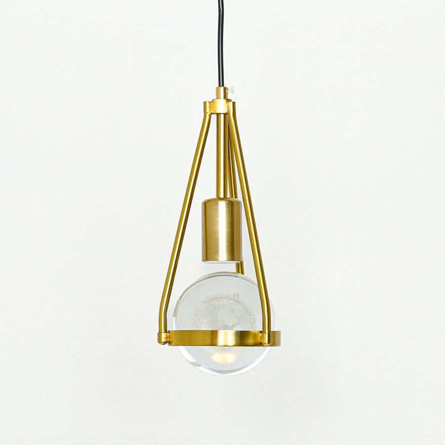 Textured clear glass and gold metal pendant light designed for stylish contemporary interior spaces.
