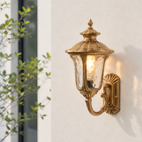 Luxury gold metal outdoor wall lantern for porch entrance garden and exterior walls with warm ambient lighting.