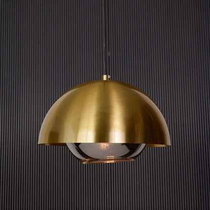 Metal table lamp with fabric shade turned off on dark background clearly showing structure finish color and minimalist styling.