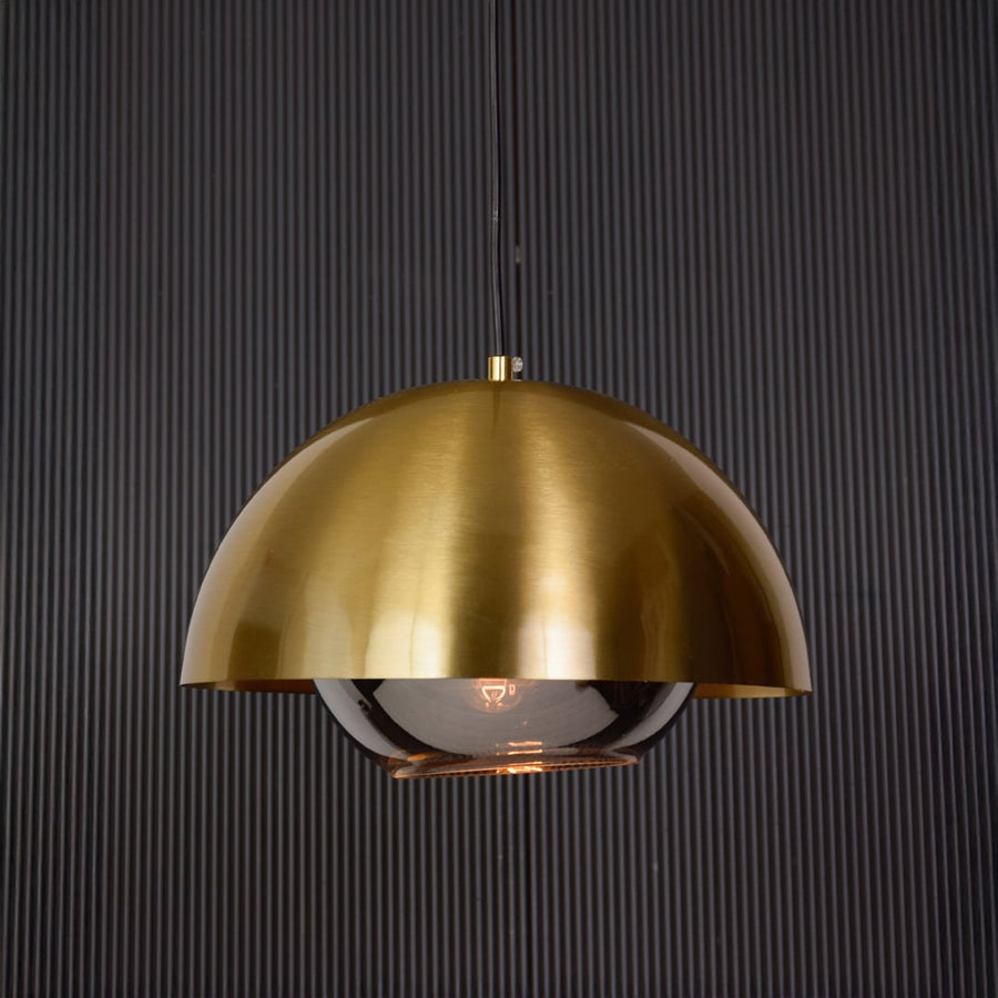 Metal table lamp with fabric shade turned off on dark background clearly showing structure finish color and minimalist styling.