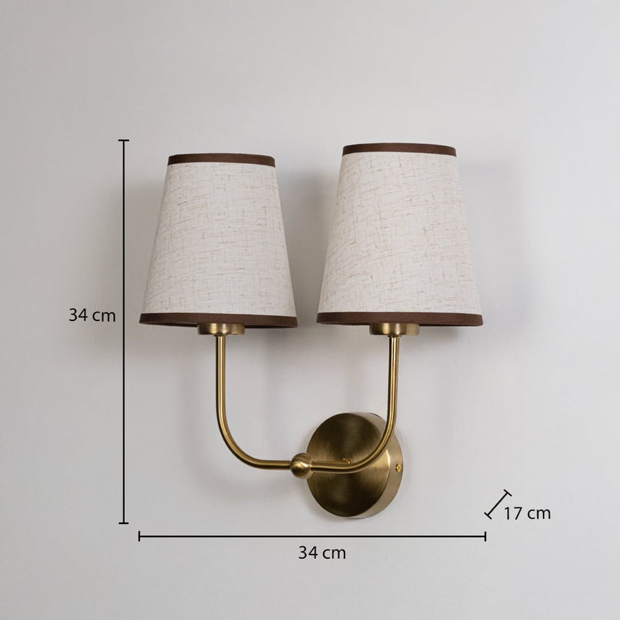 Gold double wall sconce with cream textured shades shown with 34 cm height and 34 cm width for accurate sizing.