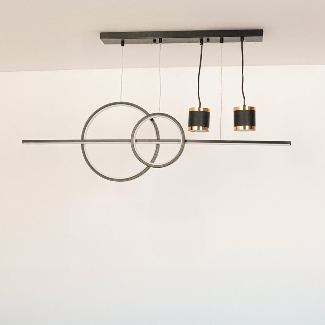 Pendant light with rings and dual spotlights in black and gold finish displayed on white background with lights turned off.