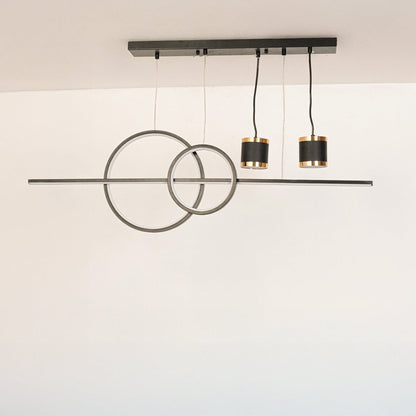 Pendant light with rings and dual spotlights in black and gold finish displayed on white background with lights turned off.