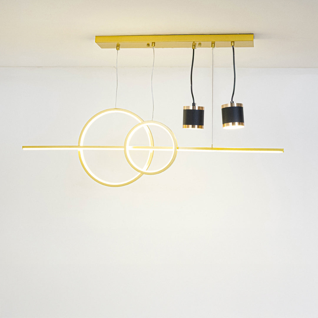 Gold metal geometric chandelier with illuminated circular LED rings creating elegant modern ambient ceiling lighting.