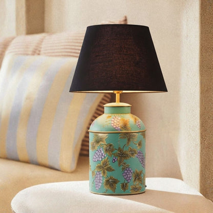 Lifestyle image of blue metal table lamp with black linen shade for elegant bedroom decor styling and modern home lighting.