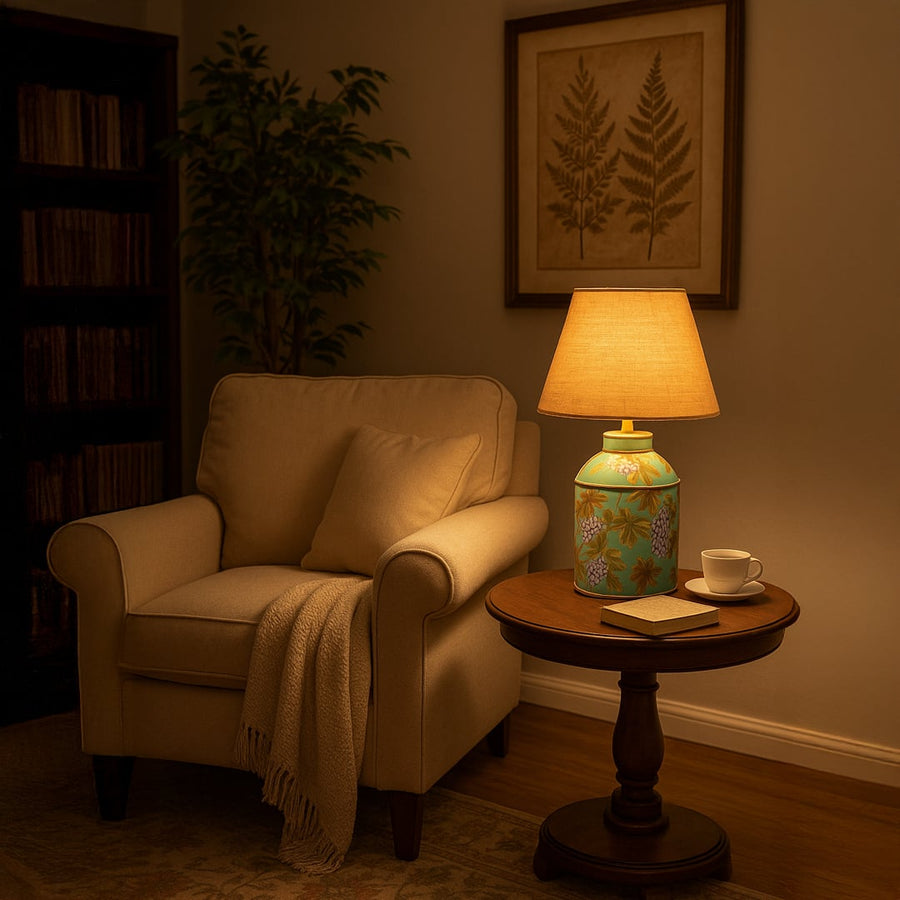 Palais mint green ceramic table lamp with beige shade styled in cozy living room creating inviting and elegant home atmosphere.