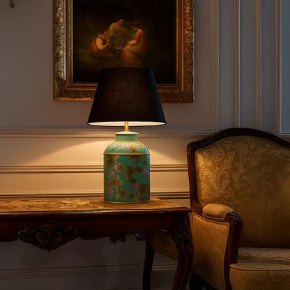 Palais mint green ceramic table lamp with black shade styled on console adding artistic contrast and elegance to classic interiors.