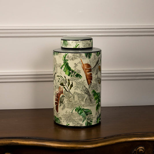 Tropical leaf jar displayed on a white background highlighting its glossy finish and botanical print.