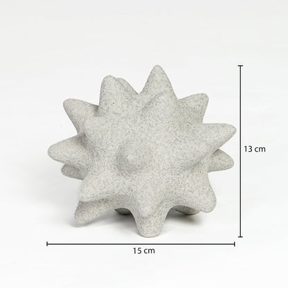 White ceramic star shaped decorative object measuring 13 cm height and 15 cm width ideal for modern tabletop decor styling.