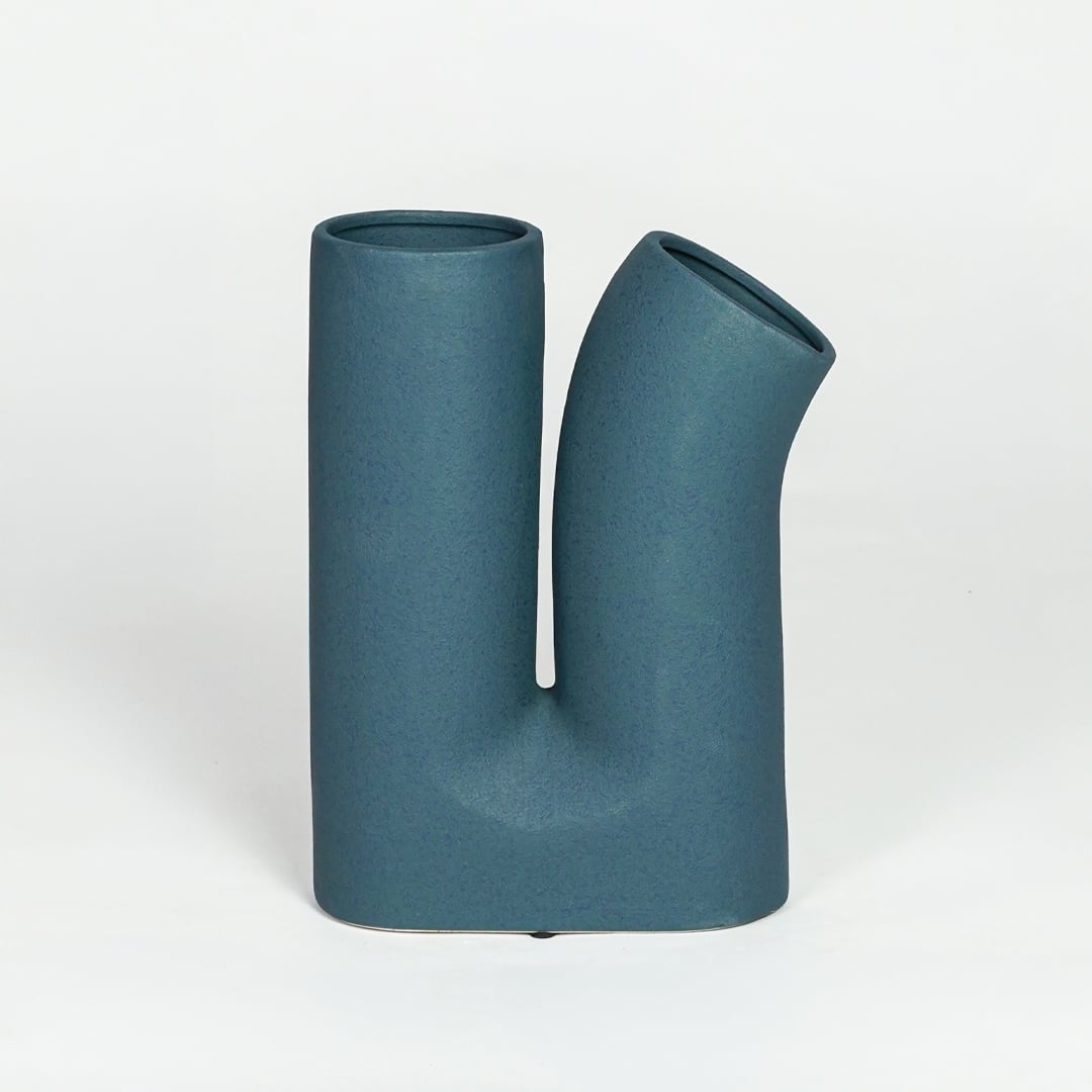 Contemporary teal ceramic double neck flower vase with smooth matte finish for minimalist home decor.