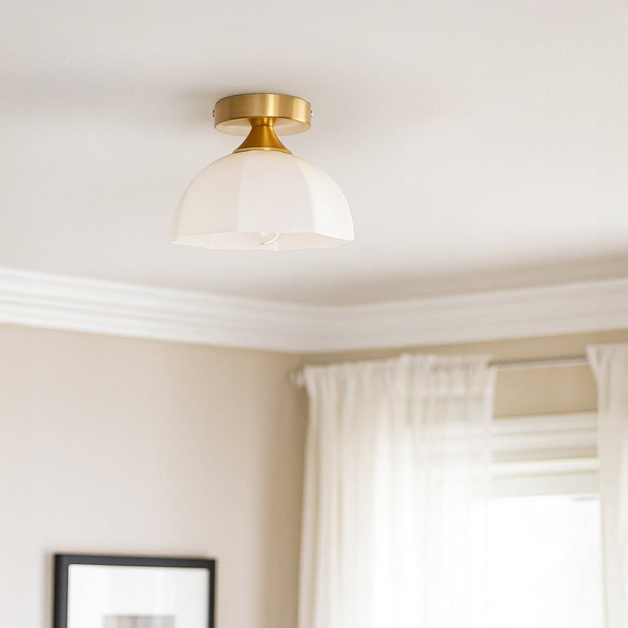 Modern white glass and gold metal ceiling light in elegant bedroom setting for classic home decor and ambient lighting spaces.