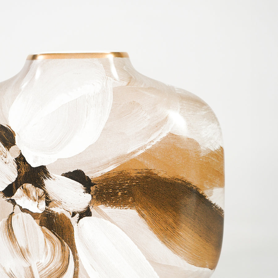 Closeup image of white ceramic painted vase with brown abstract pattern for luxury shelf decor styling display.