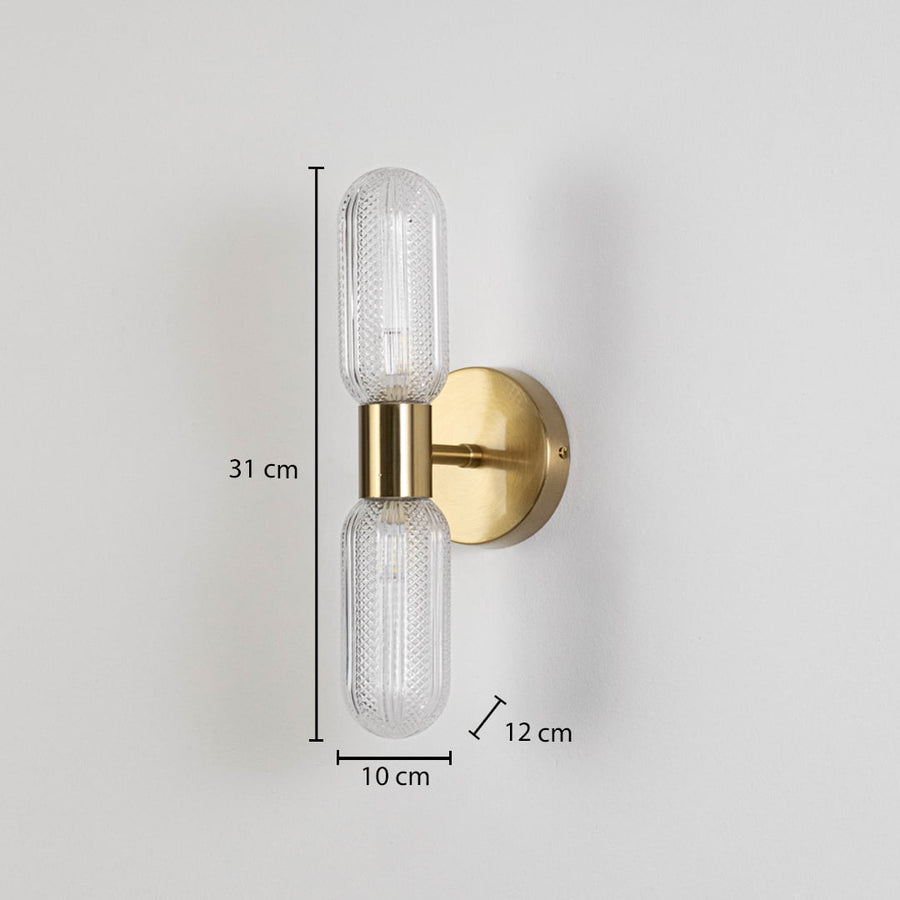 Gold wall sconce with dual textured glass tube shades shown with size 31 cm height 10 cm width 12 cm depth for accurate fitting view.