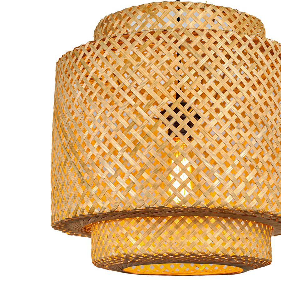 Closeup of natural beige rattan pendant light showcasing intricate weave and timeless boho style.