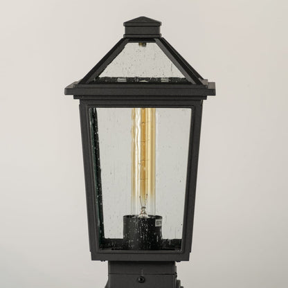 Black outdoor lantern Closeup showing the detailed metal finish and the clear pebbled glass panels.