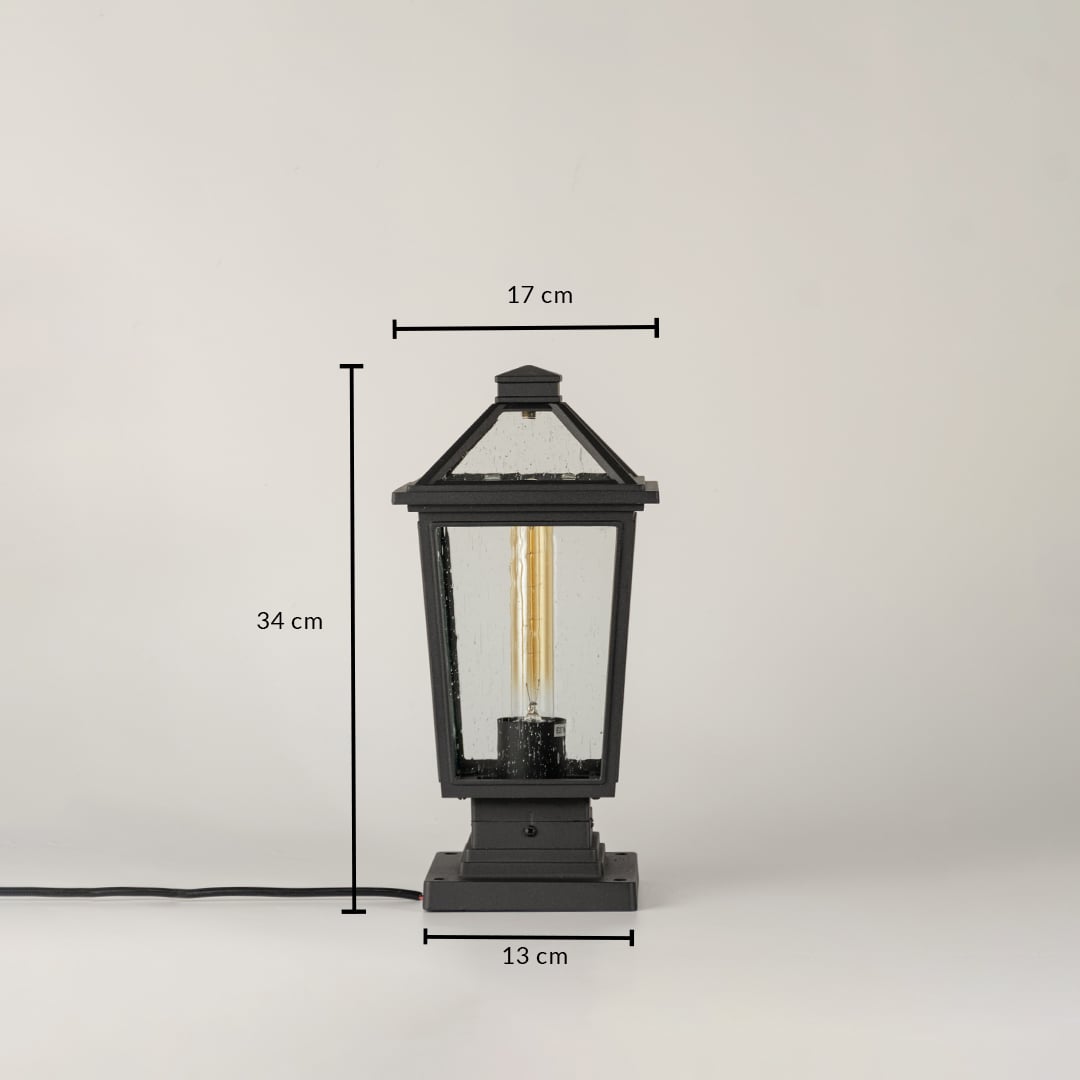 Black outdoor lantern light Dimensions Image 34 cm height by 17 cm top width by 15 cm base width.