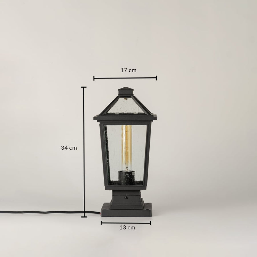 Black outdoor lantern light Dimensions Image 34 cm height by 17 cm top width by 15 cm base width.