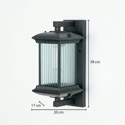 Outdoor wall light with black metal frame and ribbed glass enclosure mounted on wall 38 cm height 20 cm width 17 cm depth perfect for exterior lighting.
