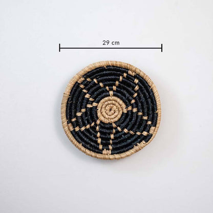Handwoven seagrass round wall basket decor in natural beige and black with spiral woven design and size guide.