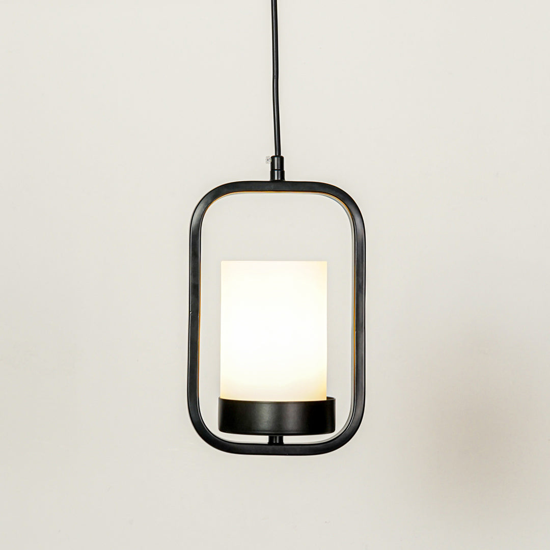 Black metal and white glass pendant light with modern lantern design for elegant home decor spaces.