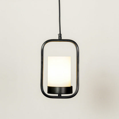 Black metal and white glass pendant light with modern lantern design for elegant home decor spaces.