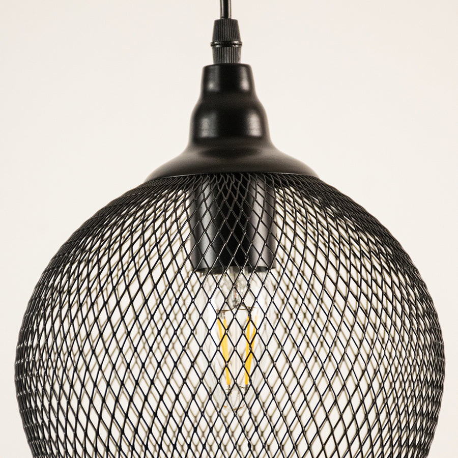 Black mesh pendant light with a white background