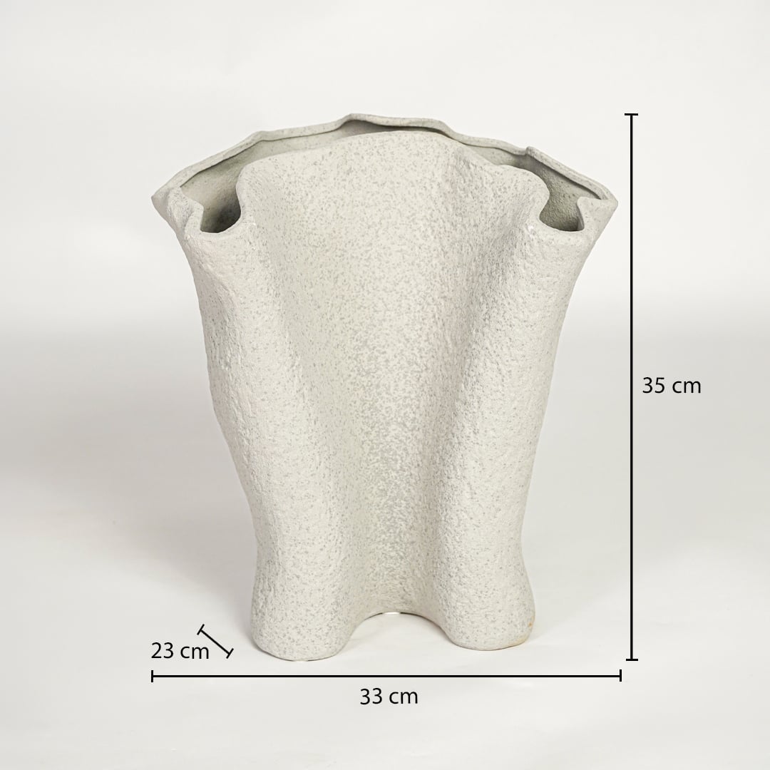 Light beige ceramic decorative vase showing 35 cm height 33 cm width and 23 cm depth suitable for floor or console placement.