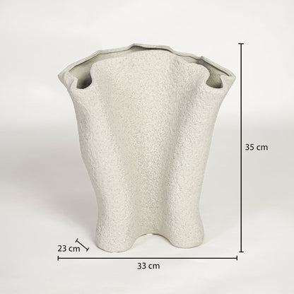 Light beige ceramic decorative vase showing 35 cm height 33 cm width and 23 cm depth suitable for floor or console placement.