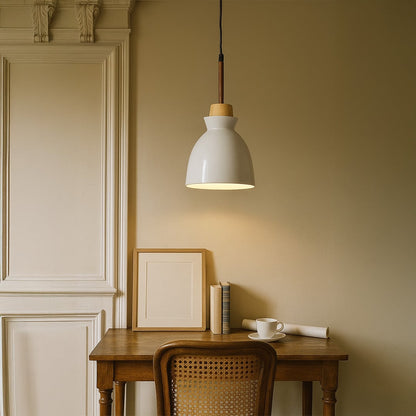White pendant light with wooden accent hanging above study desk for modern home office and dining room interior lighting.