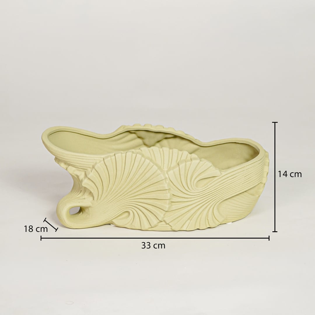 Light green ceramic decorative shell bowl showing 33 cm length 18 cm width and 14 cm height ideal for dining table centerpiece decor.