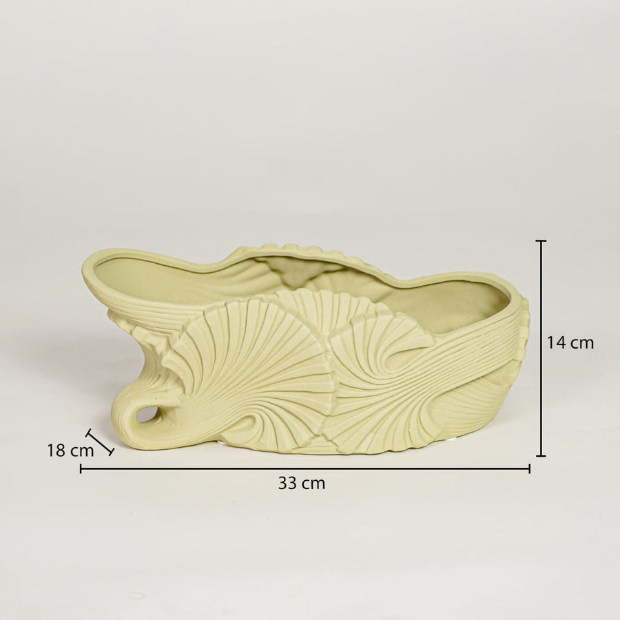 Light green ceramic decorative shell bowl showing 33 cm length 18 cm width and 14 cm height ideal for dining table centerpiece decor.