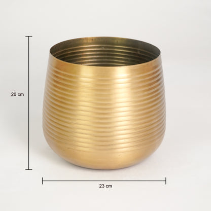 Gold ribbed metal planter pot for indoor plants tabletop shelf or home décor display showing product dimensions.