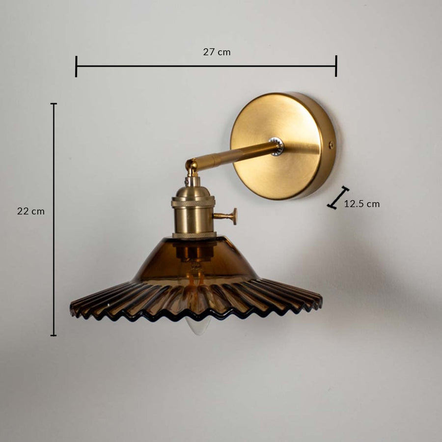 Gold metal wall light with 22 cm height 27 cm width and 12.5 cm depth for elegant modern decor spaces.