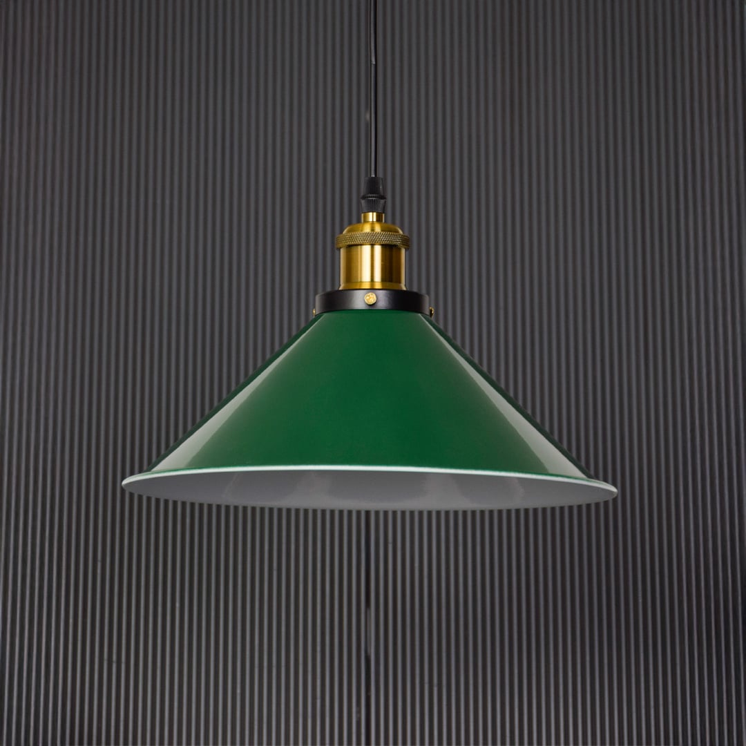 Stylish green pendant lamp with golden holder against dark backdrop ideal for adding depth to living room lighting