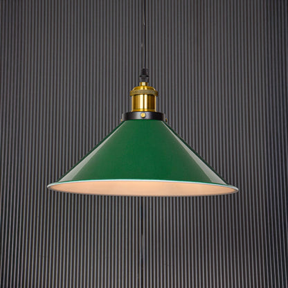 Modern green pendant lamp glowing warmly on black background creating cozy ambience for dining or bar area decor.