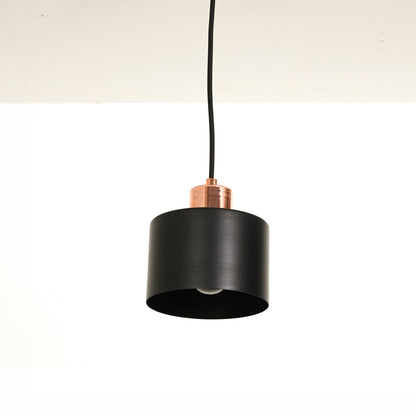 White background image of industrial black rose gold light for modern dining room decor styling with smooth matte finish.