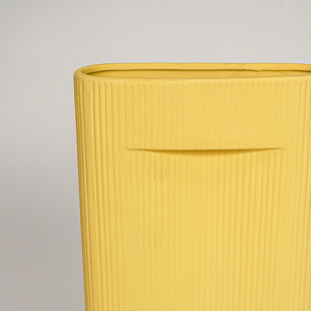 industrial yellow ceramic vase large closeup