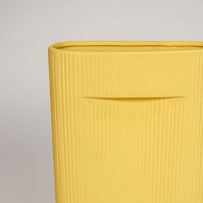 industrial yellow ceramic vase large closeup
