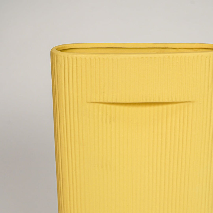 industrial yellow ceramic vase large closeup