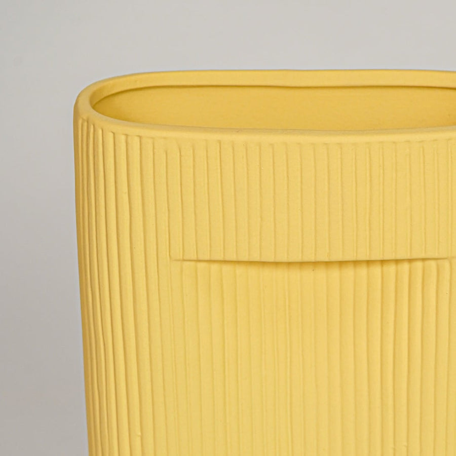 industrial yellow ceramic vase medium closeup