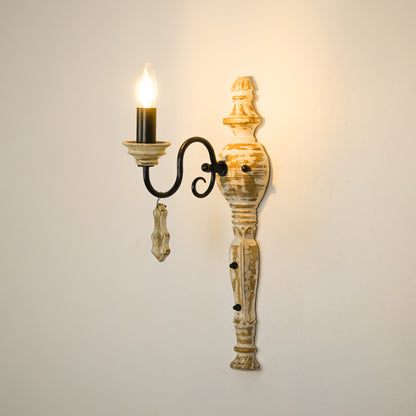 White background image of illuminated industry favorite wood and iron single light wall sconce for elegant decor styling.