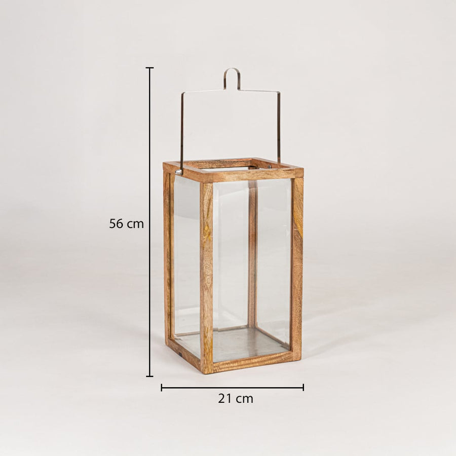 Wooden lantern with clear glass panels measuring 56 cm height and 21 cm width suitable for floor and tabletop Decor.