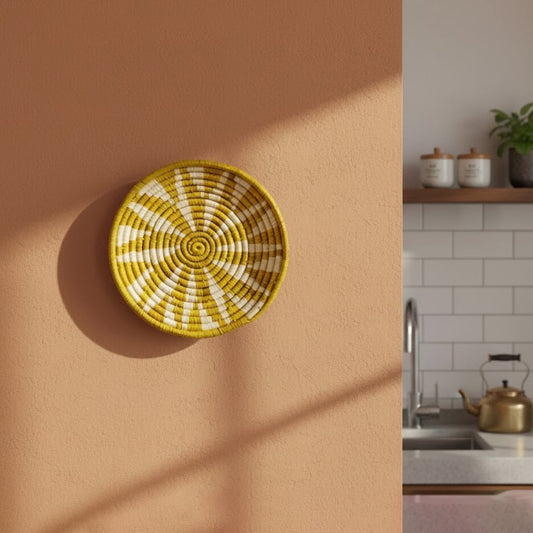 Yellow woven wall basket mounted on warm toned wall near kitchen shelves creating cheerful accent and artisanal Decor appeal.