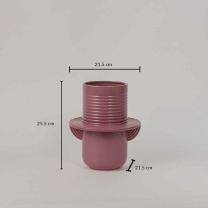 Pink ceramic vase with ribbed texture showing 25.5 cm height and 21.5 cm width ideal for decorative flower styling