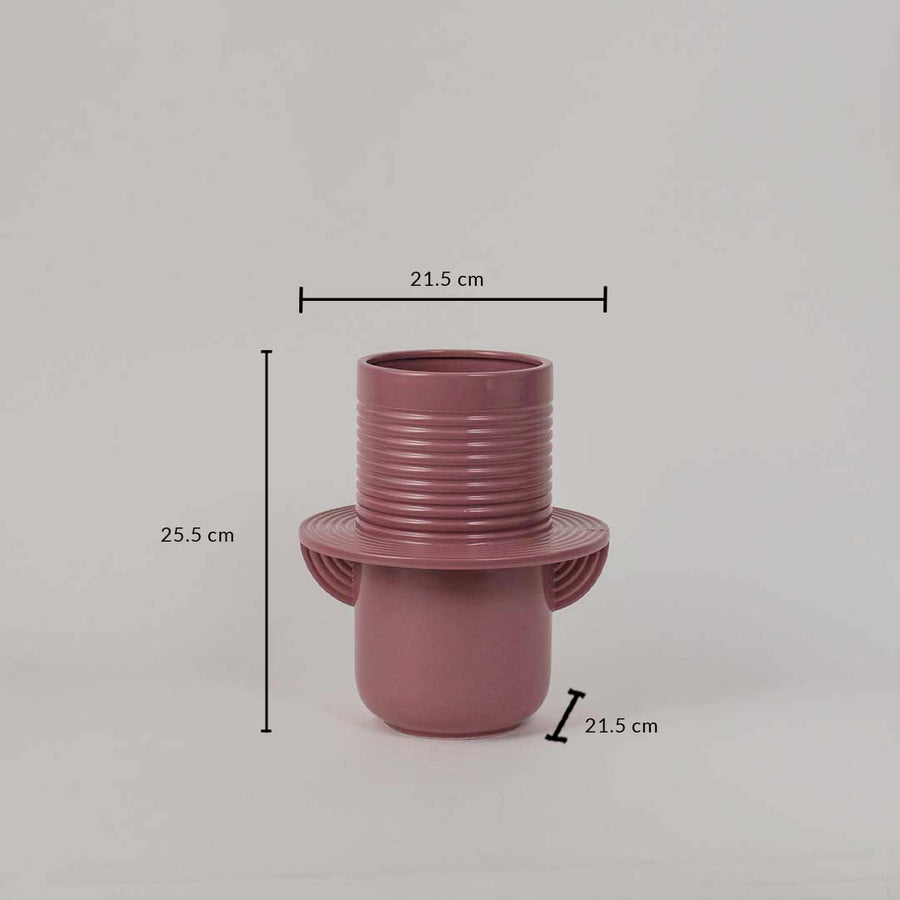 Pink ceramic vase with ribbed texture showing 25.5 cm height and 21.5 cm width ideal for decorative flower styling