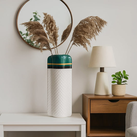 Elegant tall vase with a glossy green top and textured white body styled on a clean surface creating a refined decor look that blends easily with modern interiors.
