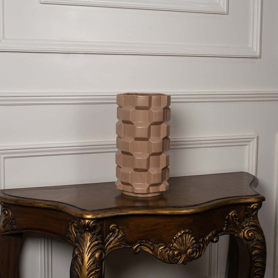 Brown geometric ceramic vase displayed on a clean white background ideal for minimal home decor and contemporary tabletop styling.