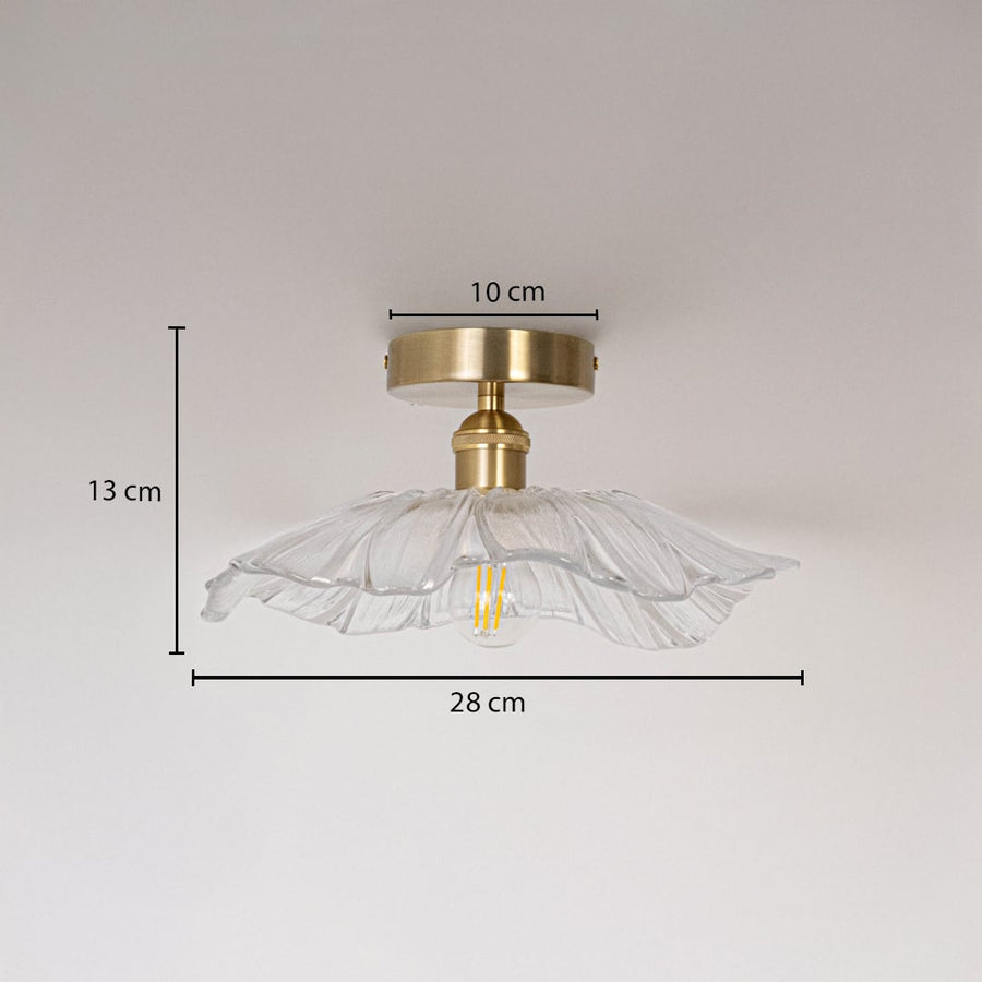 Ceiling light with brushed gold base and flower glass shade shown with size dimensions 13 cm height 28 cm width and 10 cm base.