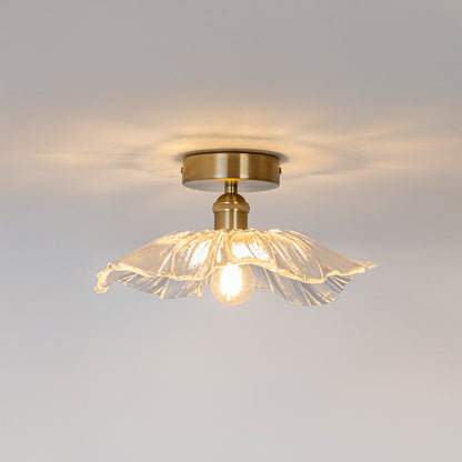 Modern gold metal ceiling light with artistic wire glass shade for luxury interior decor and ambient lighting spaces.